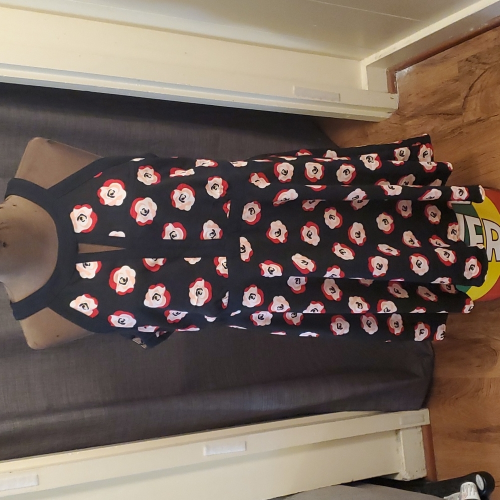 Retro flower print fit and flare dress with zipper and button closure at neck